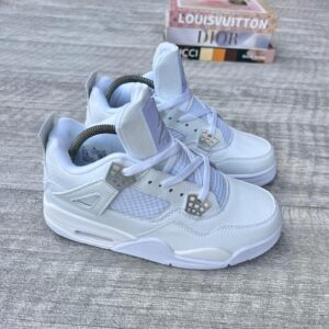A pair of white leather sneakers with diamond buckle details, perfect for adding a touch of style to any outfit.